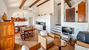 A spacious living area with a dining table, sofas, and a kitchen in the background. - Nice home in MONS with private swimming pool, can be inside or outside (MONS)