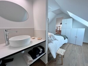 A modern bathroom with a large oval sink and a mirror. - La Laiterie - CRACH - Vacation Rental (CRACH)