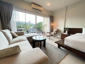 Deluxe Double Room, Balcony, Mountain View | Living area - The Zen Suites (Rawai)