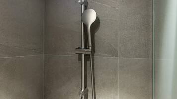 Deluxe Comic Book | Bathroom | Hair dryer, bathrobes, slippers, bidet