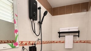 A bathroom with a sink, toilet, and shower. - Hotel & Recreation Apsara Bukit Residen (Kuala Lipis)
