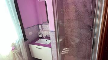 Hair dryer, bidet, towels, soap
