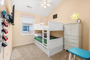 A child's bedroom with bunk beds, a desk, and a cabinet. - Oceanside,Pool,Skee-ball,Nintendo,Pets,Beach Gear (Ocean City)
