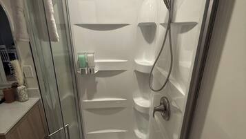 Shower, hair dryer, towels, soap