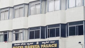 A multi-story building with a sign for 'Hotel Maurya Palace' and 'Jewel Rock' restaurant. - Hotel Maruya Palace (Mysore)
