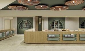 A reception area with a central counter, arched shelving units, and patterned ceiling lights. - Costa Borgo Ragusa (Ragusa)