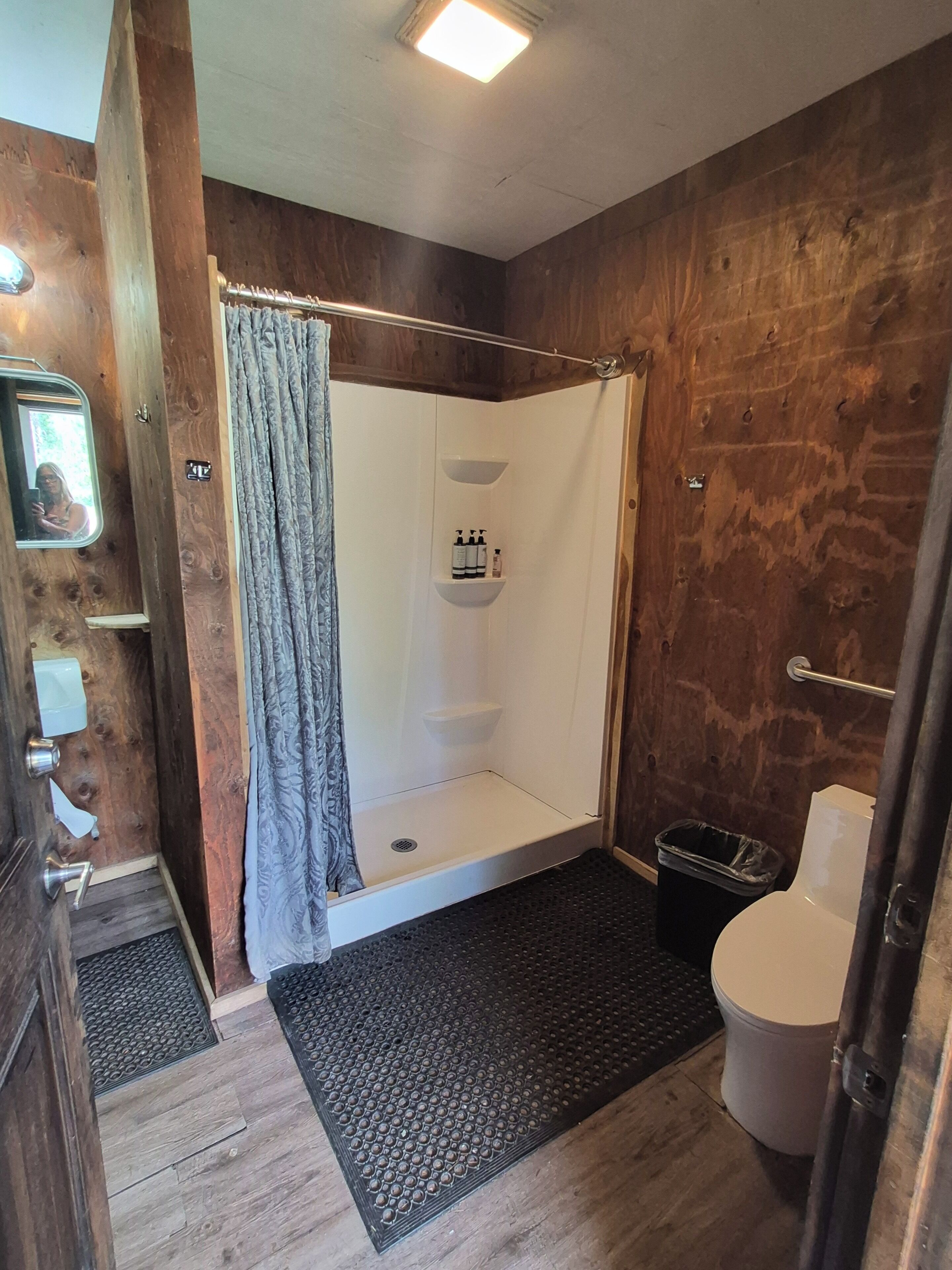 Shower, towels, soap, toilet paper