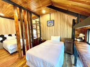 Junior Room, Garden View | Desk, laptop workspace, blackout curtains, soundproofing - Lam Mountain Retreat (thanh pho phu quoc)