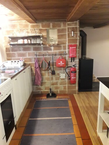 An easily accessible cabin with a fireplace near a hiking area outside Hässleholm
