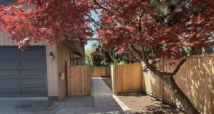 Modern Bright Lynn Valley Suite with Patio, Parking & Evergreen Surroundings