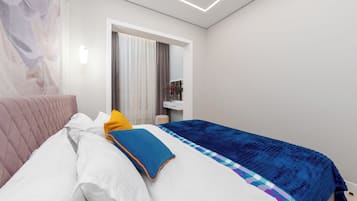 A modern bedroom with a bed, a bedside table, a mirror, and a window with curtains.
