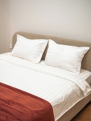 Apartment, City View | Minibar, desk, laptop workspace, iron/ironing board - Comfort City Resedential Complex (Almaty)