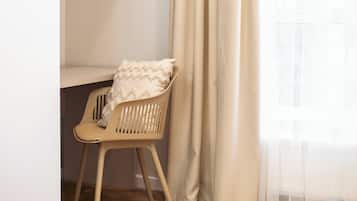 Minibar, desk, laptop workspace, iron/ironing board