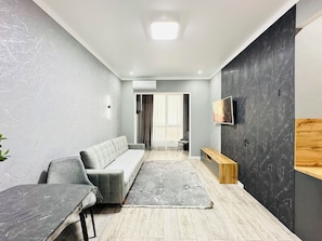 Apartment, Mountain View | Living area - Loft Apartment near MEGA Alma-Ata (Almaty)