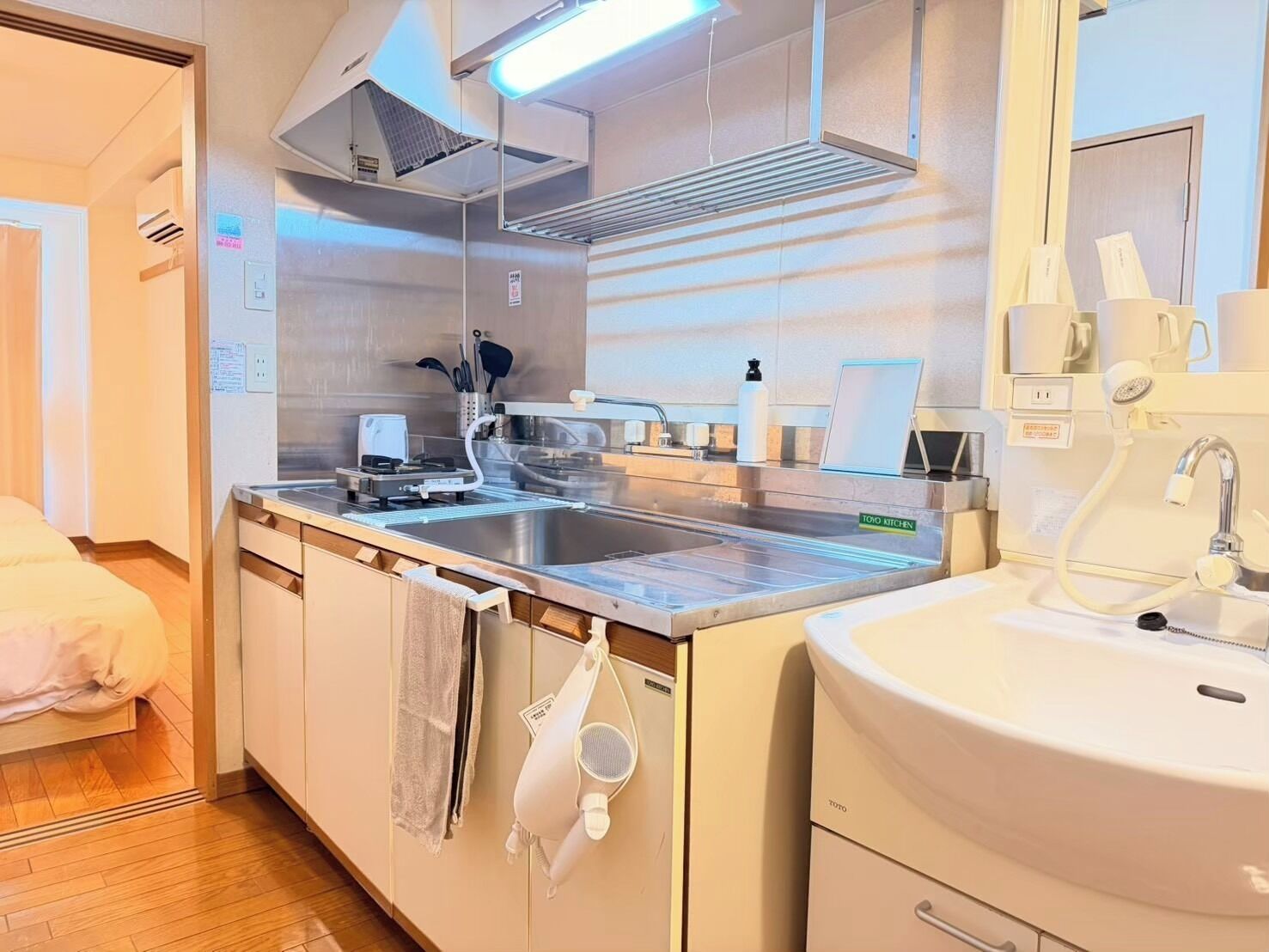 Fridge, microwave, stovetop, cookware/dishes/utensils