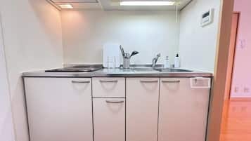 Fridge, microwave, stovetop, cookware/dishes/utensils