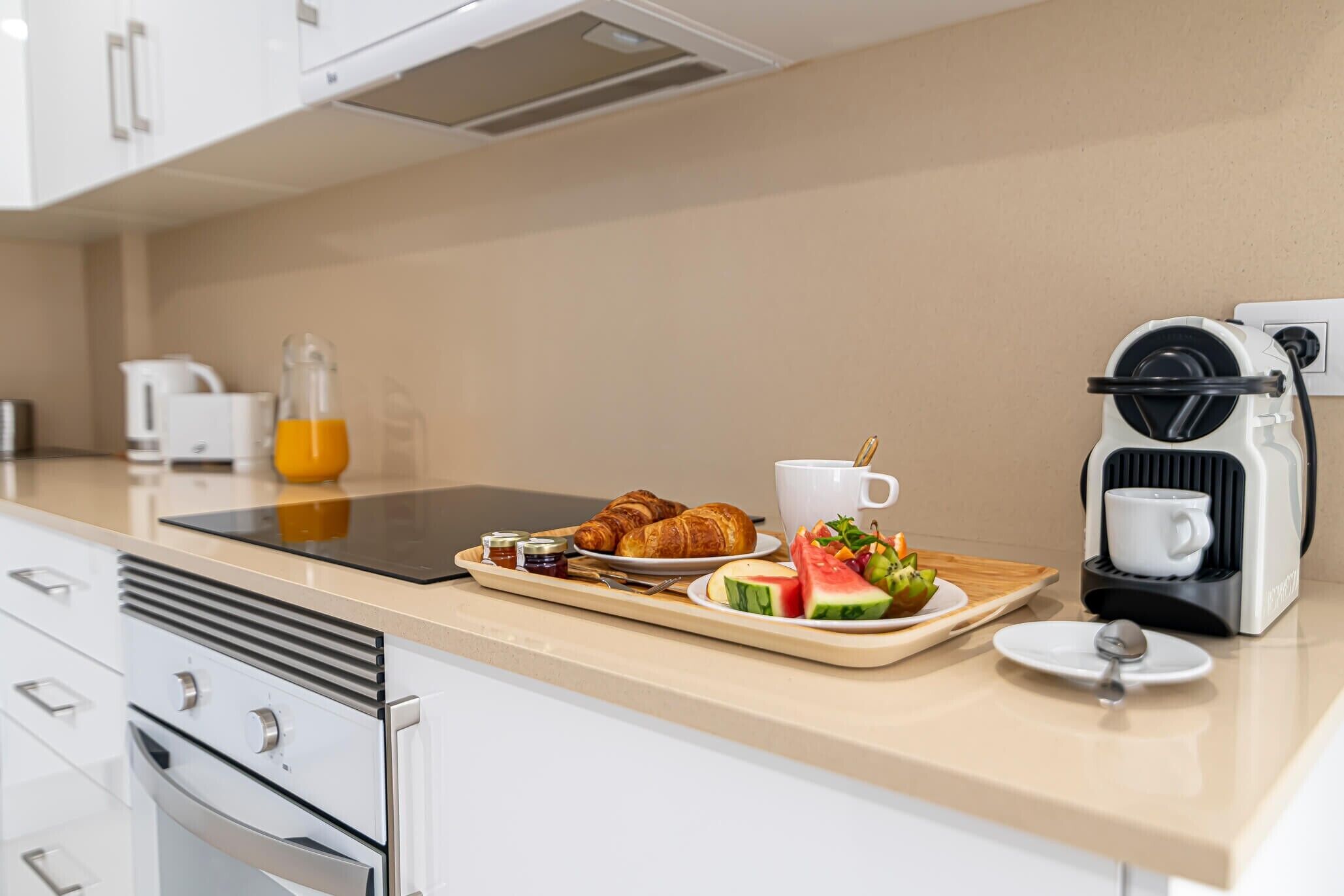 Coffee/tea maker, fridge, microwave, oven