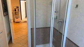 Shower, hair dryer, shampoo