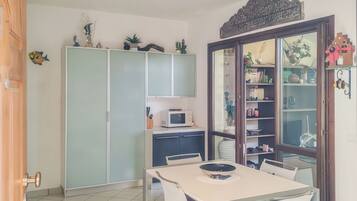Apartment, Patio, Sea View | Dining room