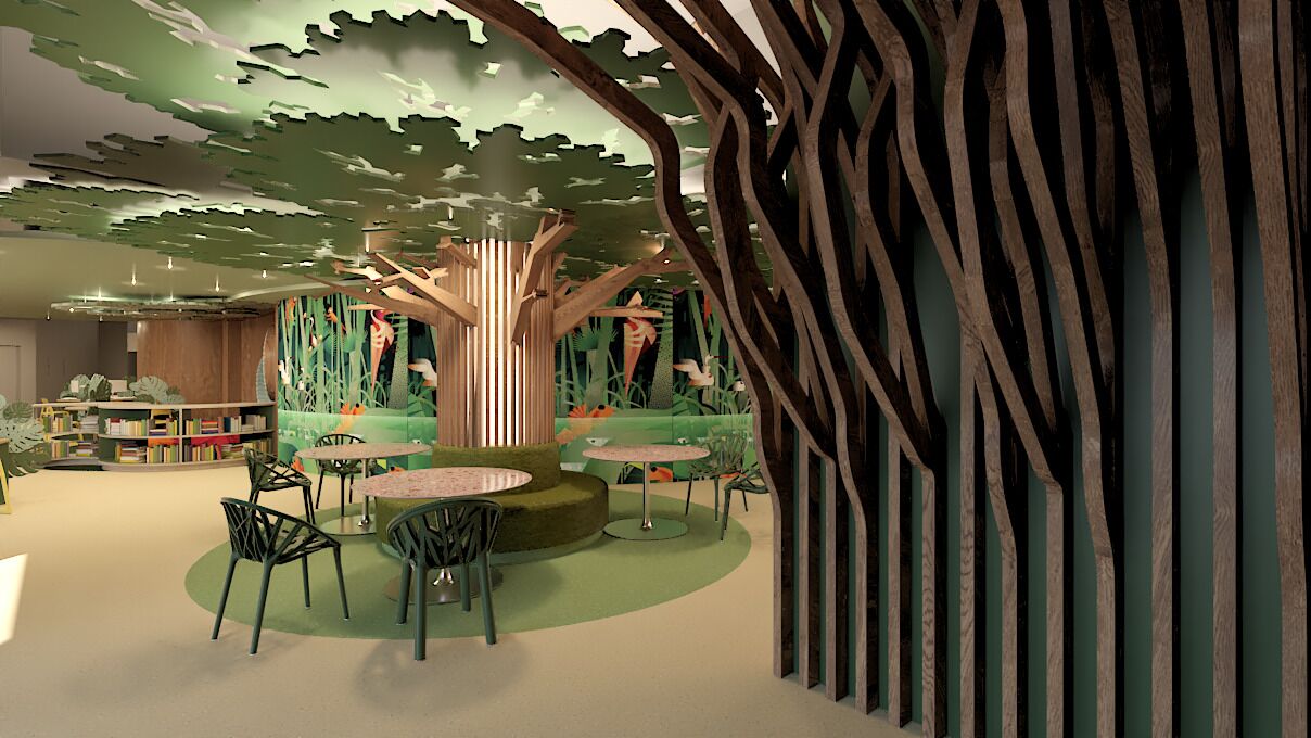 A children's play area with a tree-themed design, including a large tree structure and a circular seating area.