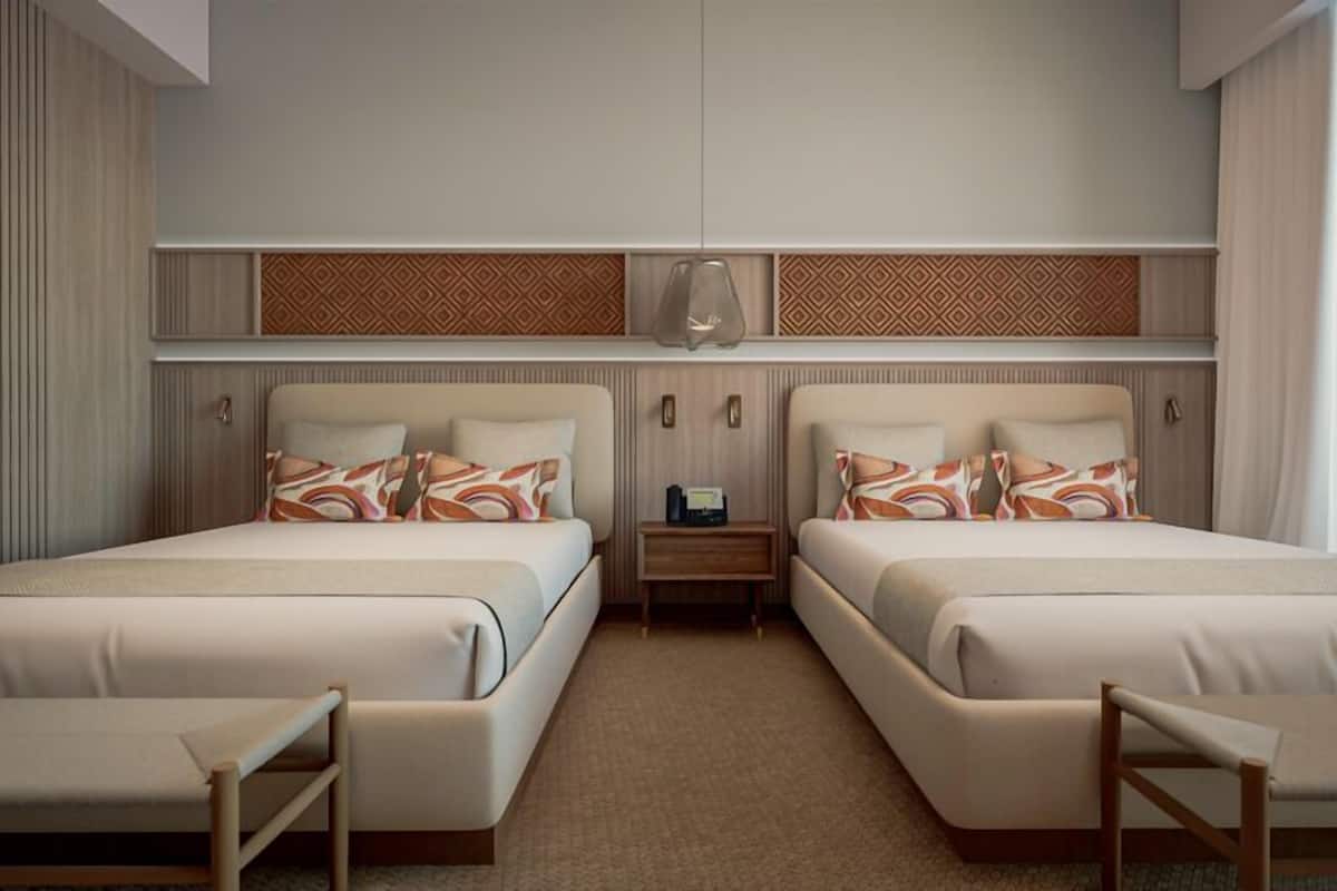 Habitación Deluxe, 2 camas matrimoniales, vista al océano | Ropa de cama de alta calidad, minibar, escritorio y cortinas blackout
