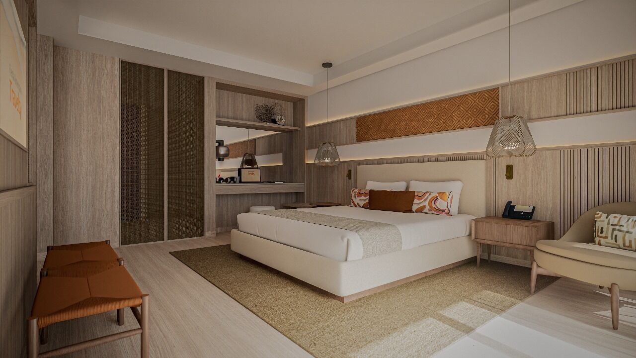 Une chambre moderne avec un grand lit, des tables de chevet, un bureau et une chaise.