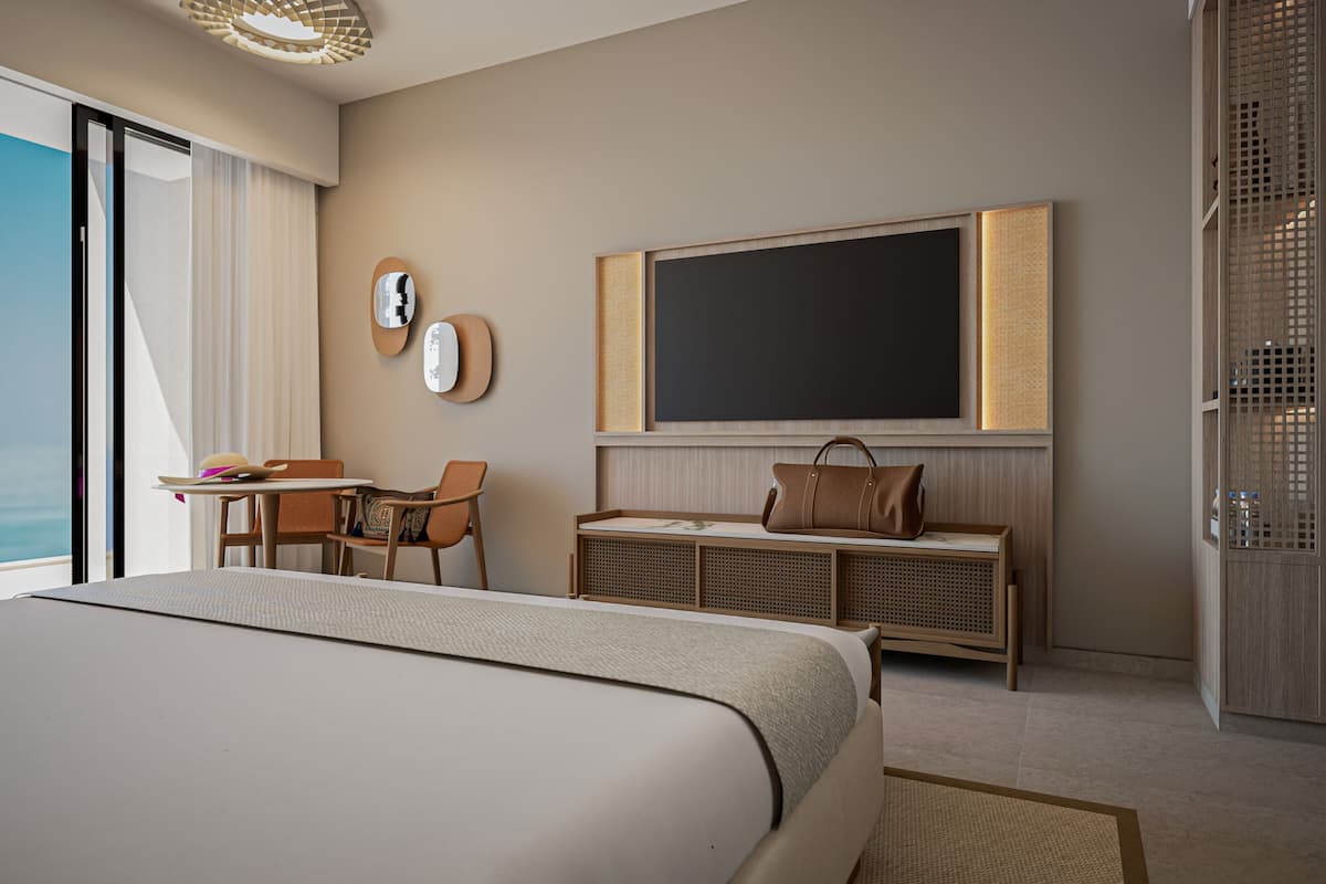 Habitación Deluxe, 1 cama King size, vista al océano | Ropa de cama de alta calidad, minibar, escritorio y cortinas blackout