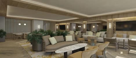 A modern living room with a sofa, armchairs, a coffee table, and a TV.