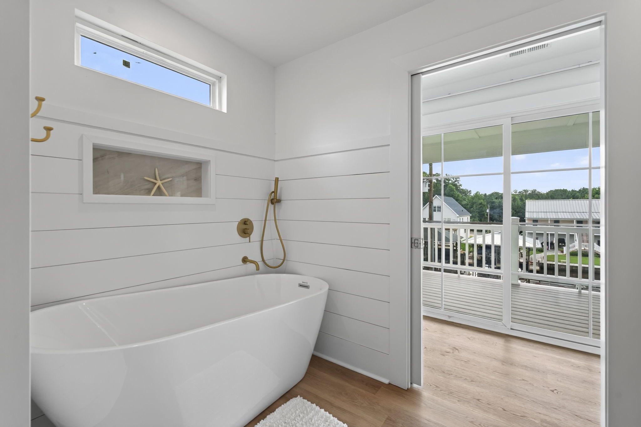 Shower, hair dryer, towels, toilet paper