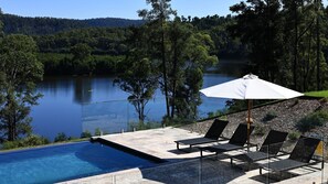 A pool area with a view of a lake, surrounded by trees and hills. - The Lakehouse, Kangaroo Valley (Kangaroo Valley)