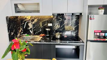 Deluxe Apartment, Balcony | Private kitchen | Fridge, microwave, stovetop, rice cooker