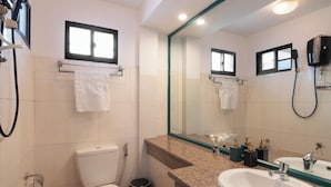 A bathroom with a toilet, sink, and shower. - Lynhapartment Cochinchine (Ho Chi Minh City)