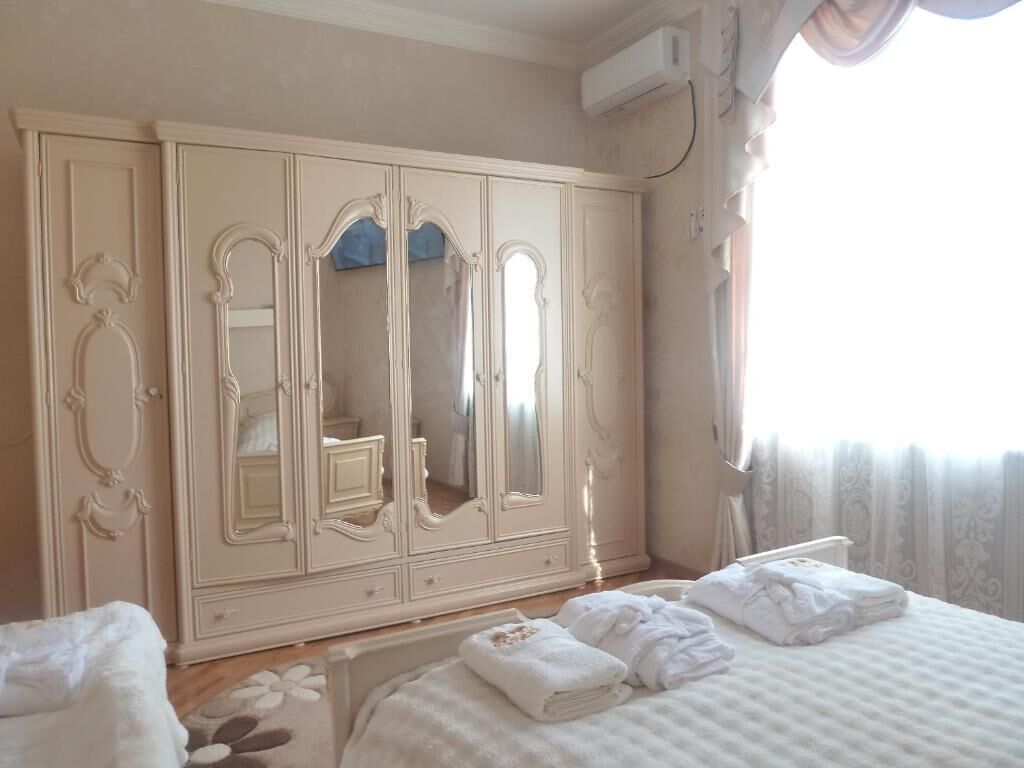 Deluxe Quadruple Room | Blackout curtains, iron/ironing board, free WiFi