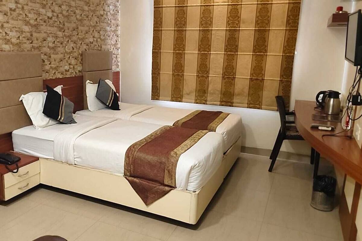 Double or Twin Room, 2 Single Beds | In-room safe, desk, laptop workspace, blackout curtains
