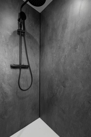 A modern shower with a handheld showerhead and a handheld faucet. - K2 - Luxury Apartment: Terrace and View of the Slopes (Gérardmer)