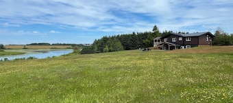 Serenity - Cottage on a private 4 acre waterfront lot surrounded by nature.