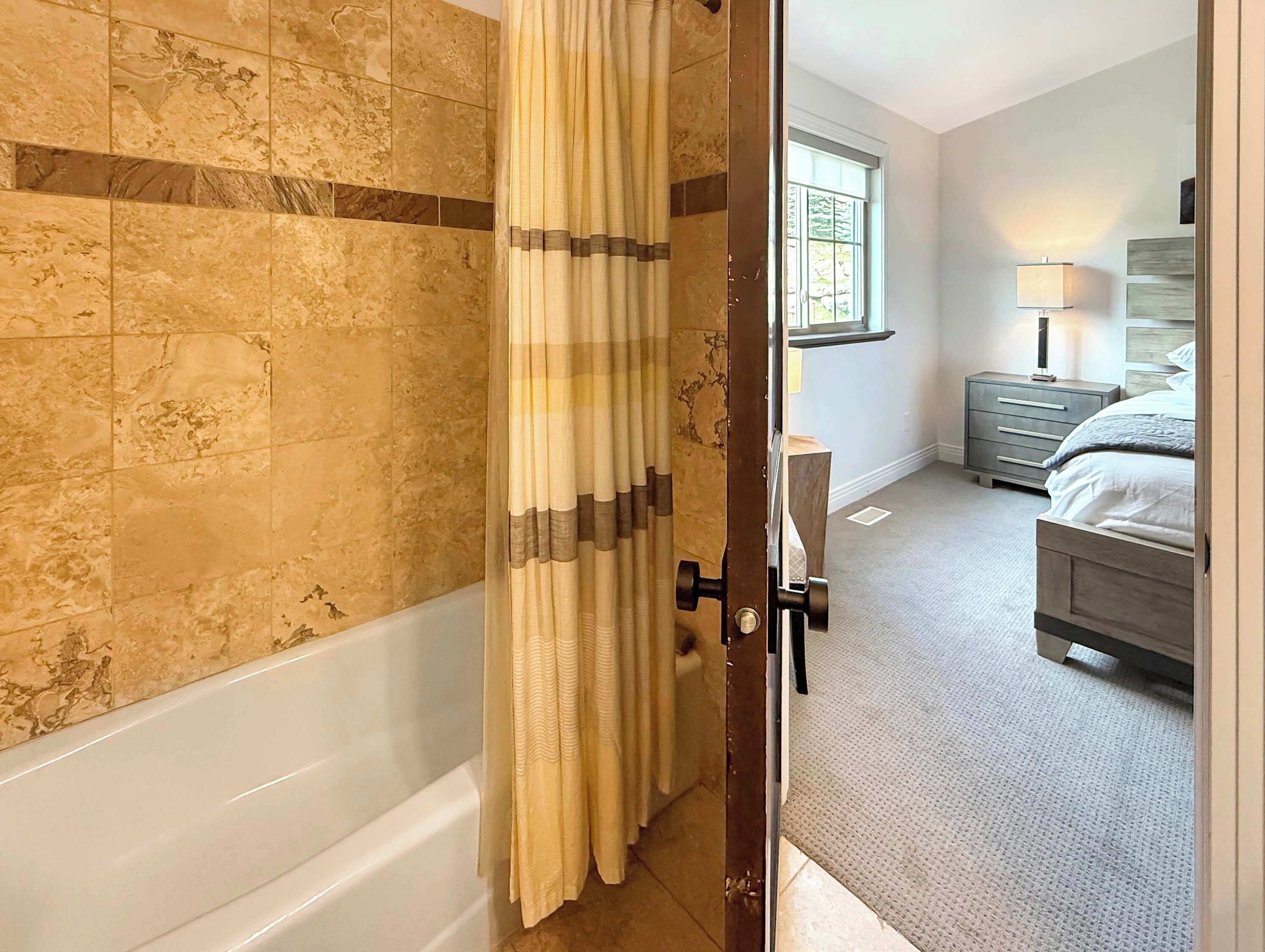 Shower, hair dryer, towels, shampoo