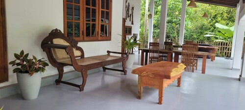 Gorgeous 4BR en-suite villa retreat with private gardens & artisan interiors.