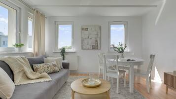 Economy Apartment, Non Smoking, Private Bathroom | Living area | 40-inch flat-screen TV with cable channels, Netflix, Hulu
