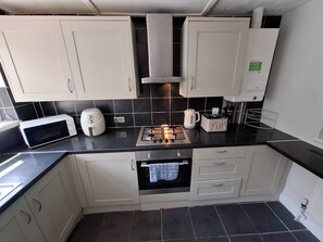 Maison, 4 chambres | Cuisine privée