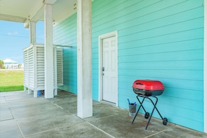 Outdoor shower and bbq grill can also be found on the ground level patio - 2nd Row Beachside Home with Easy Beach Access & Inviting Interior (Galveston)