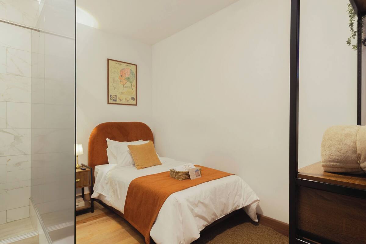 Habitación individual Deluxe | Wifi gratis y ropa de cama
