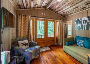 Living area - Located across the street from LaPrade's Marina on Lake Burton, and just 15 miles from the historic Lake Rabun Hotel and downtown Clayton, the Cona LaPrade Cabin is perfectly situated to enjoy the best of North Georgia's mountains and lakes.  <br><br (Clarkesville)