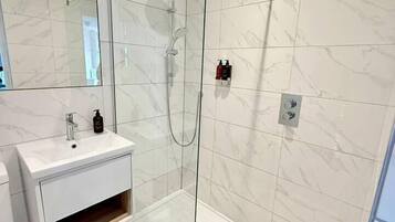 Hair dryer, towels, soap, shampoo