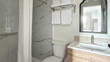 Superior Room, 1 King Bed, Non Smoking | Bathroom | Free toiletries, hair dryer, towels, soap