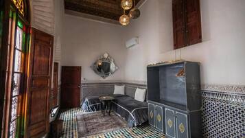 Suite familiar, balcón | Interior
