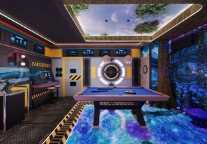 A control room with a pool table, monitors, and a forest-themed mural. - 10 BD/ 8 BA/ Windsor Cay (15866 CK) (Clermont)