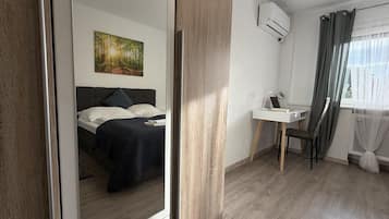 2 bedrooms, desk, iron/ironing board, travel cot