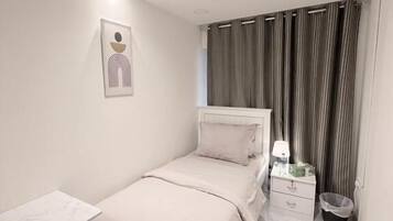 Blackout drapes, iron/ironing board (on request), WiFi (free)