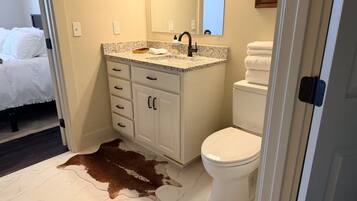 Shower, towels, soap, toilet paper